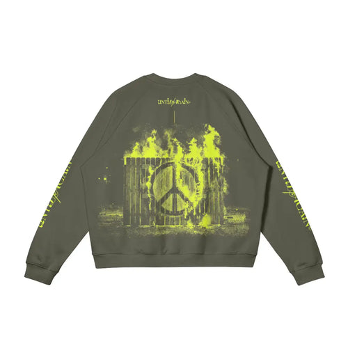 Olive green streetwear sweatshirt with neon yellow burning fence and peace sign graphic on back