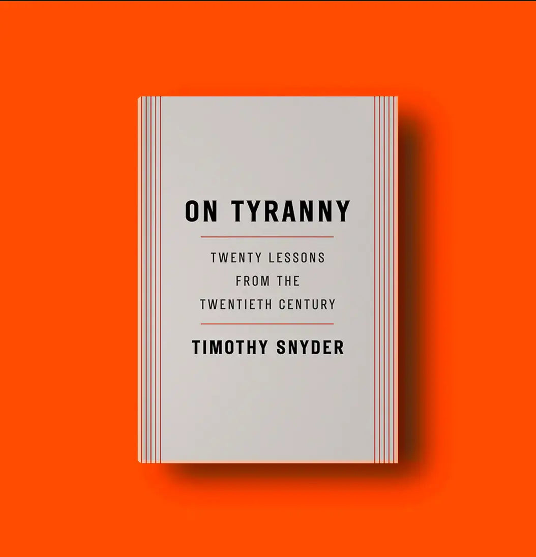 On Tyranny book cover with bold black text on a gray background and orange border accents